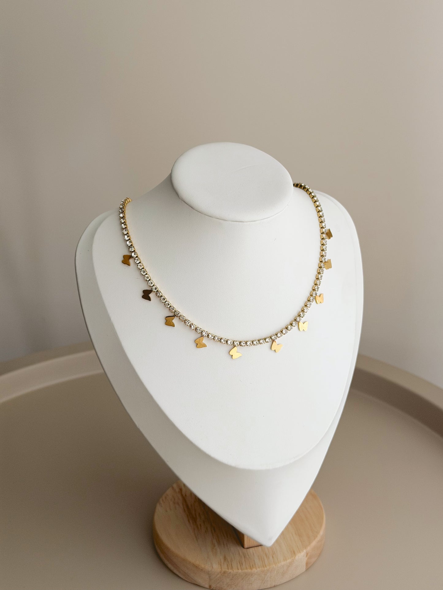 Gold butterfly tennis necklace