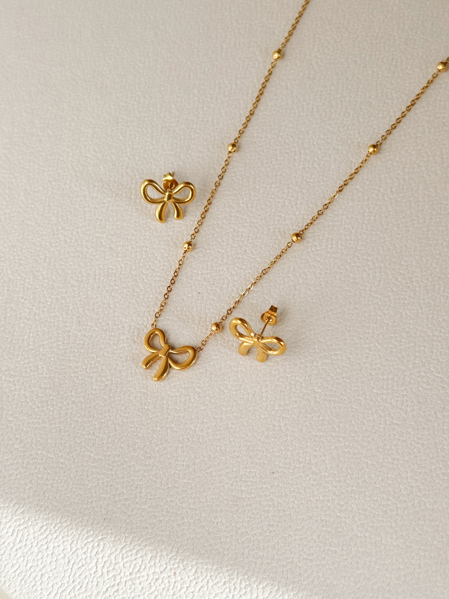 Bow necklace and earrings