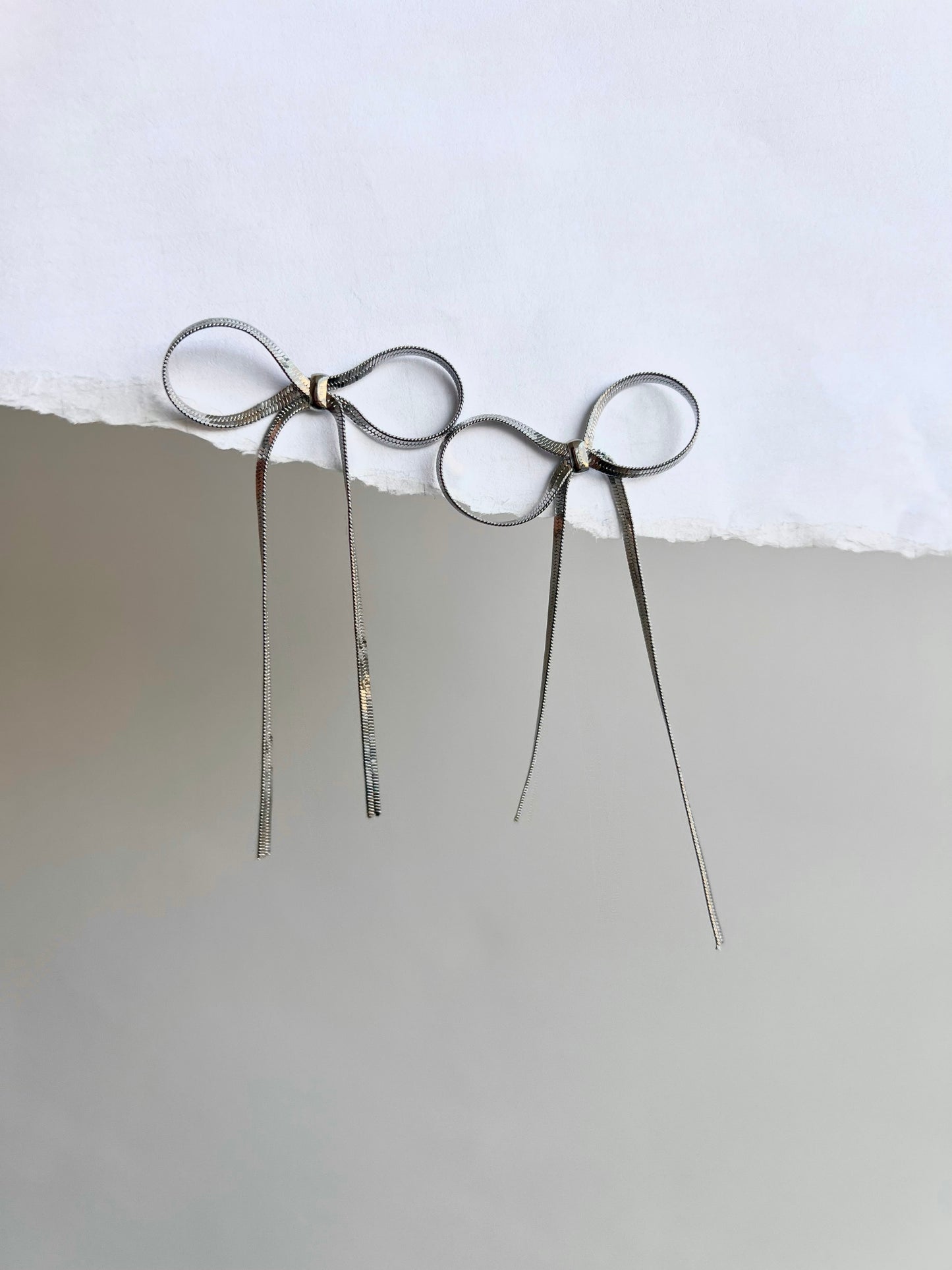 Snake bow earrings