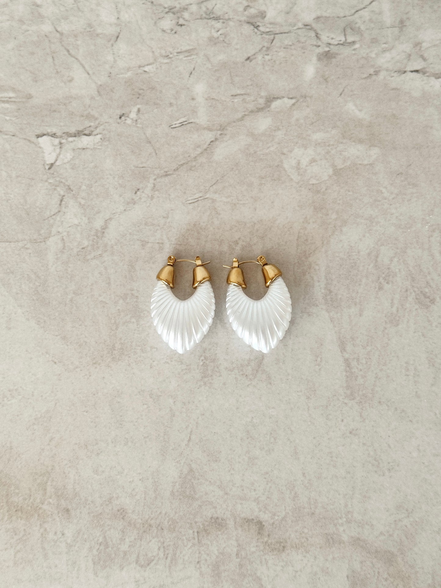 White bold earrings