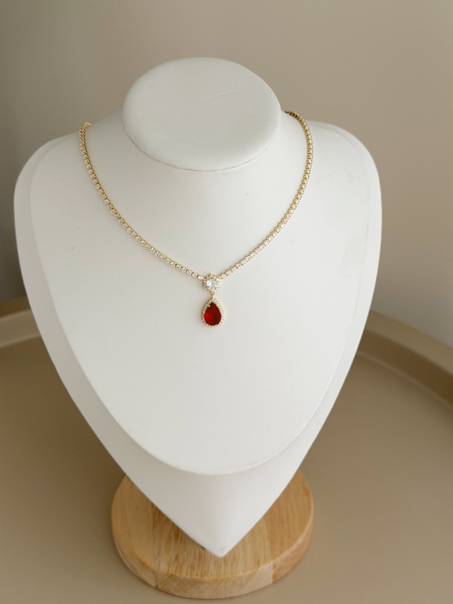 Red charm gold tennis necklace