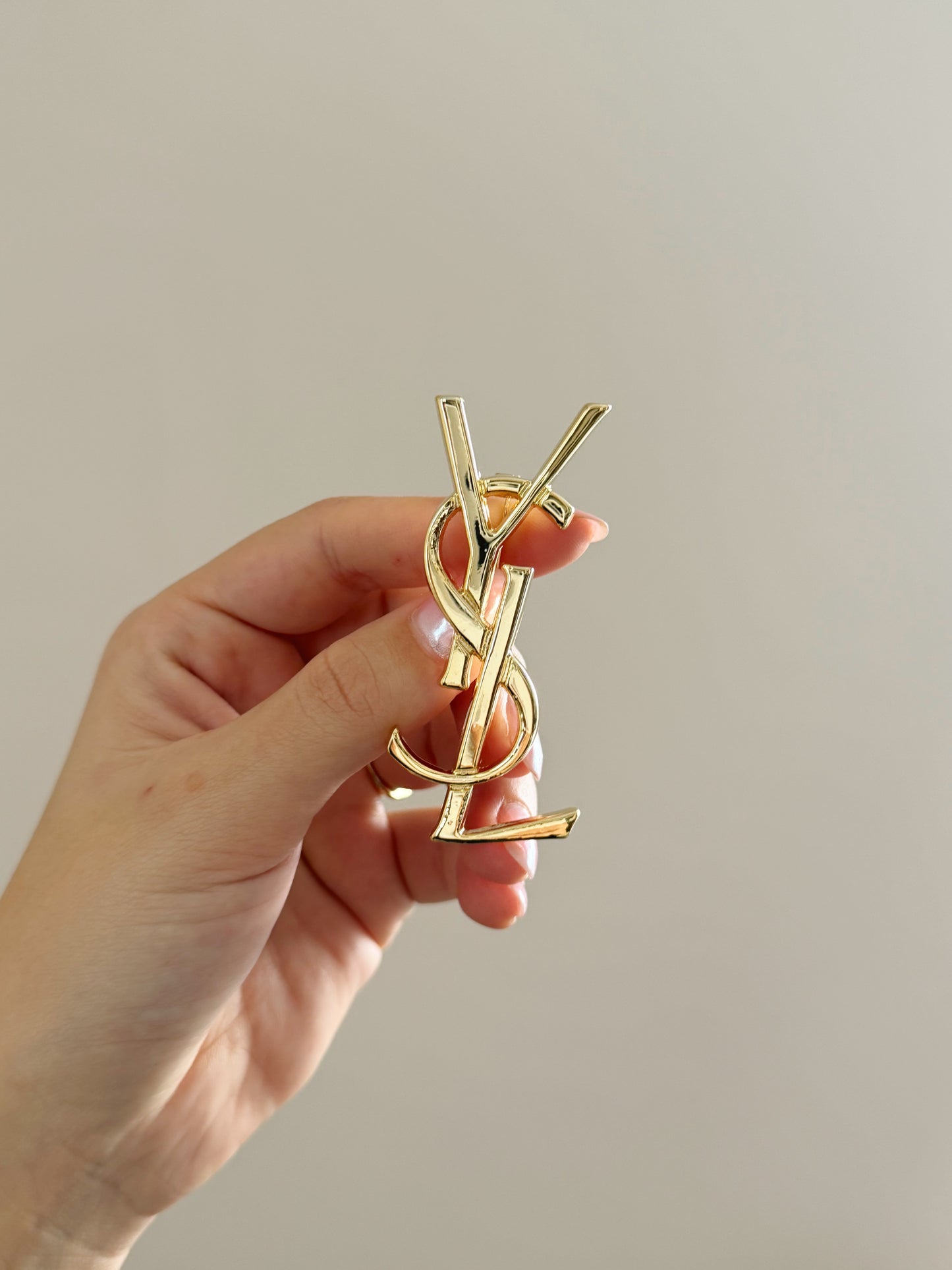 YSL brooch