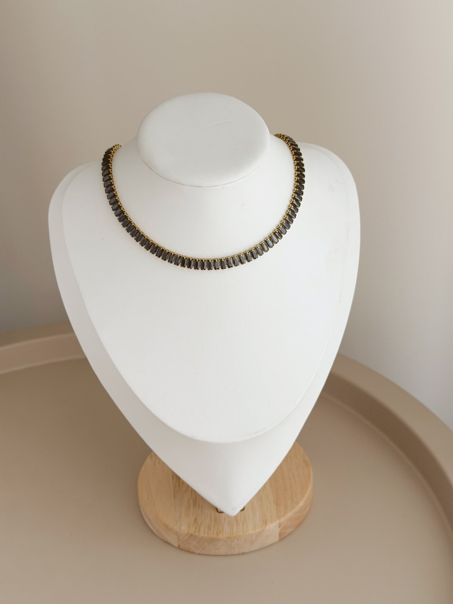 Black and gold tennis necklace