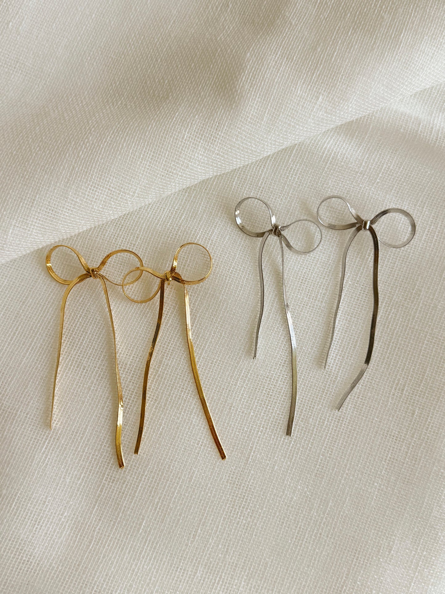 Snake bow earrings