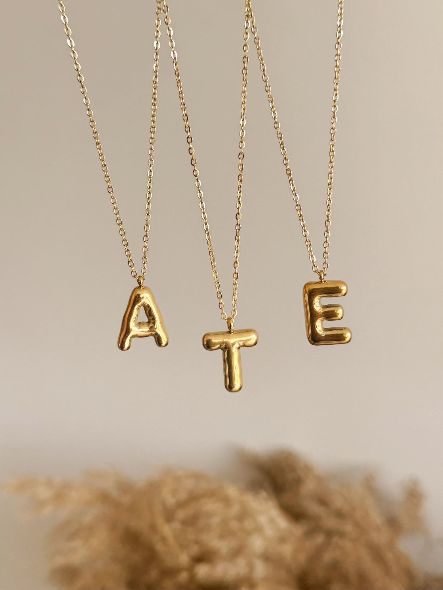 Bubble initial necklaces