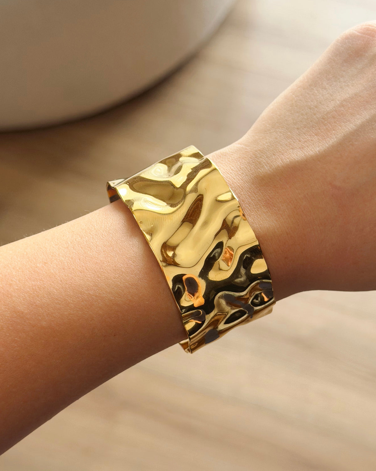 Gold chunky hand cuff
