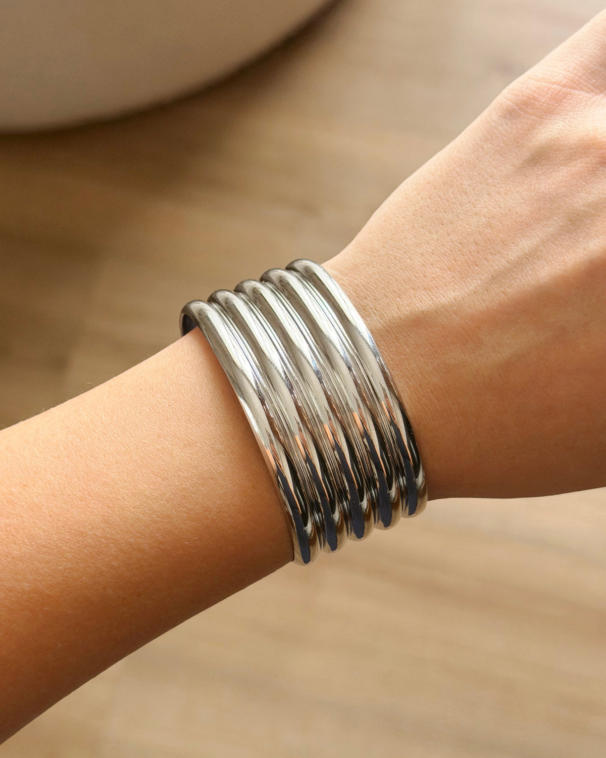 Silver lines hand cuff
