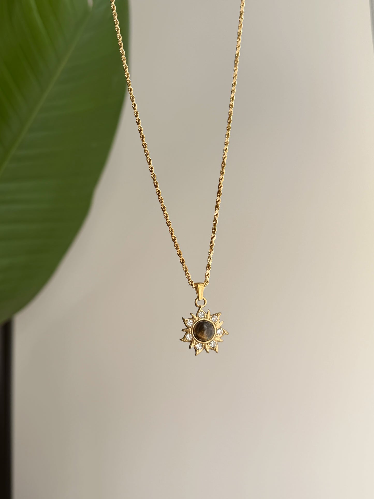 Rapunzel golden sun necklace
