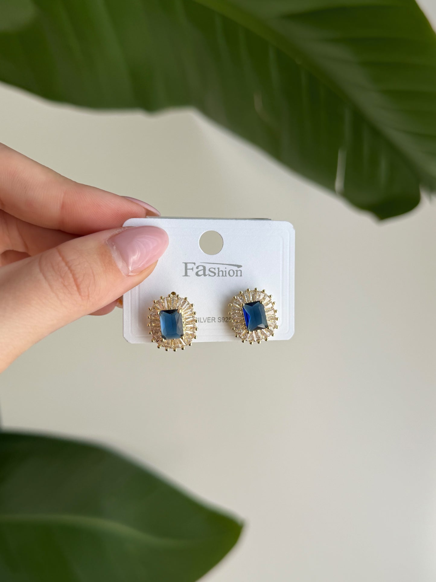 Gold and blue stone class earrings