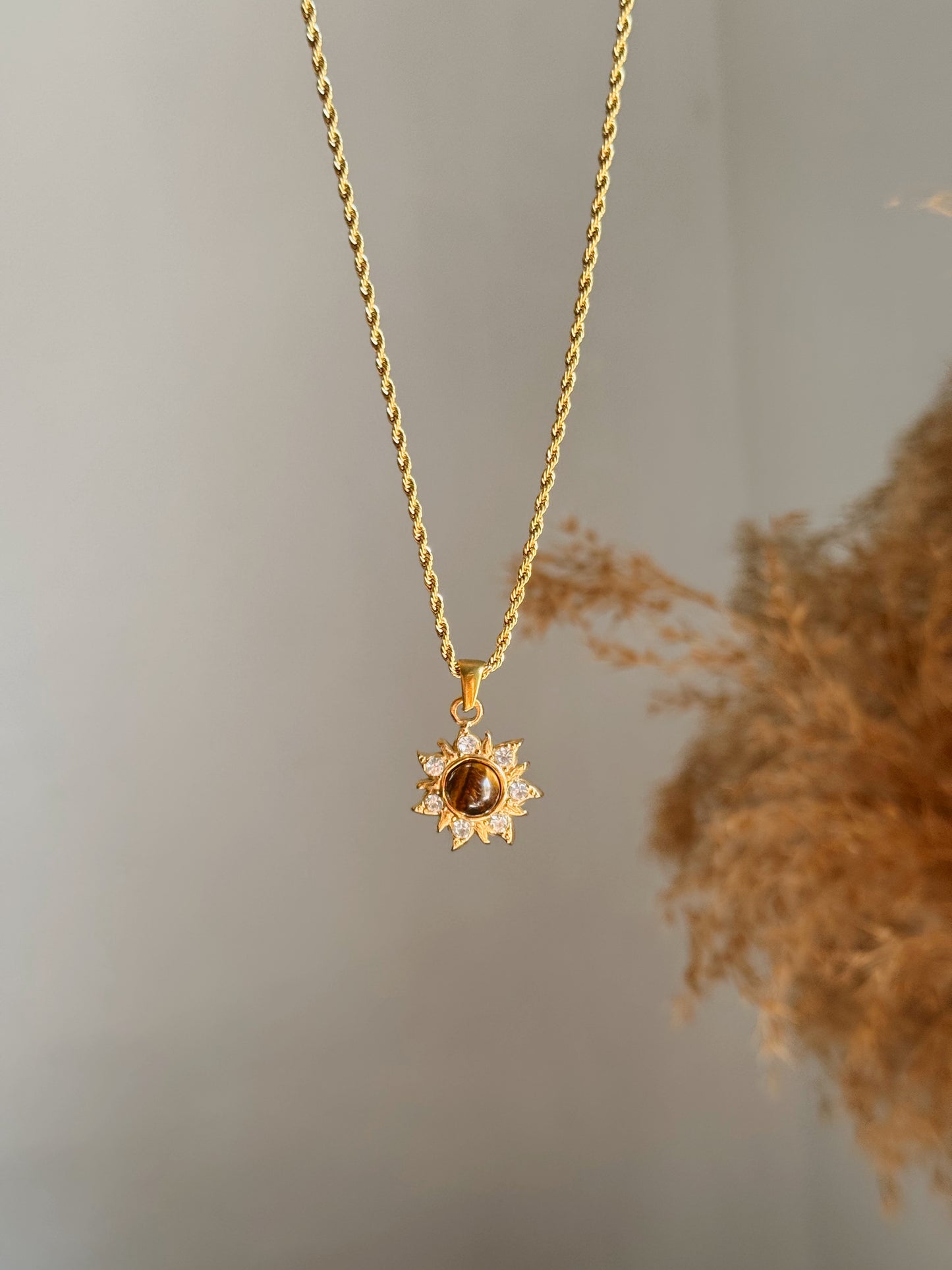 Rapunzel golden sun necklace