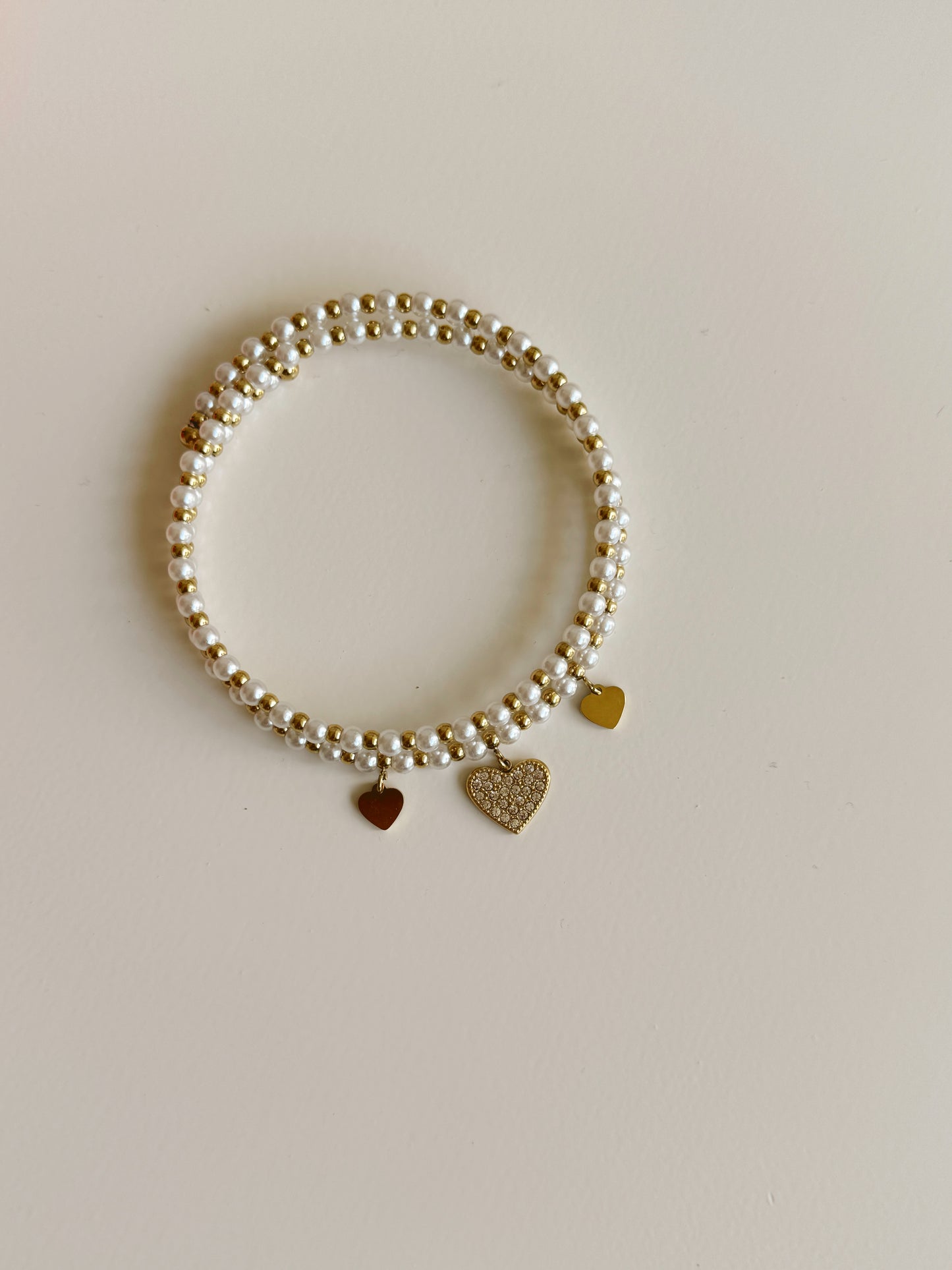 Pearls and hearts bracelets