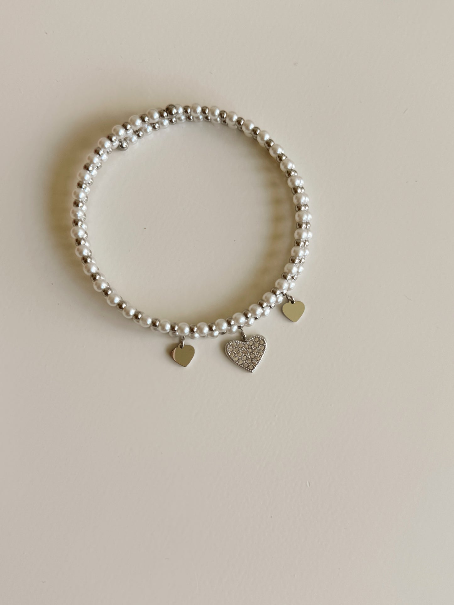 Pearls and hearts bracelets