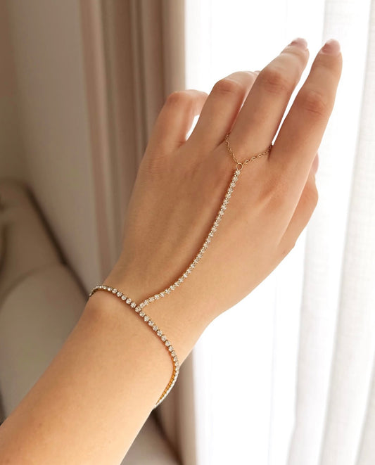 Gold tennis hand chain