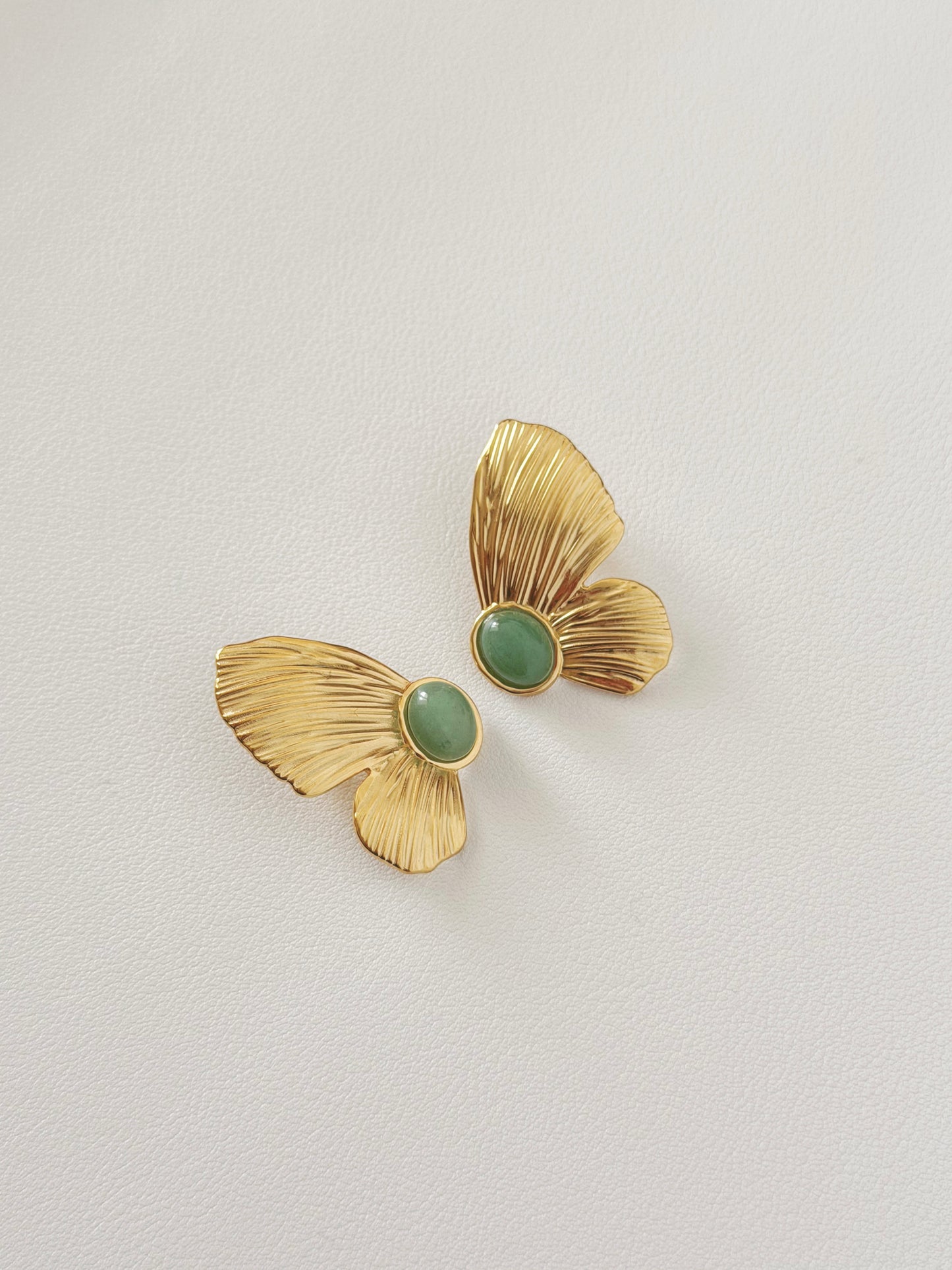 Butterfly green stone earrings