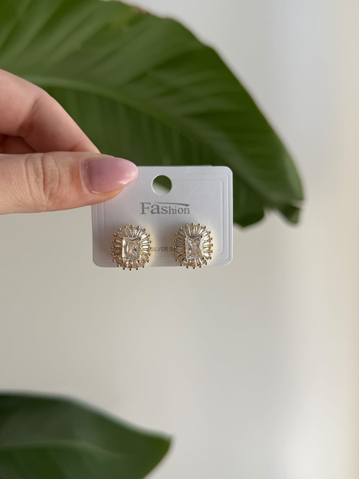 Gold and white stone class earrings