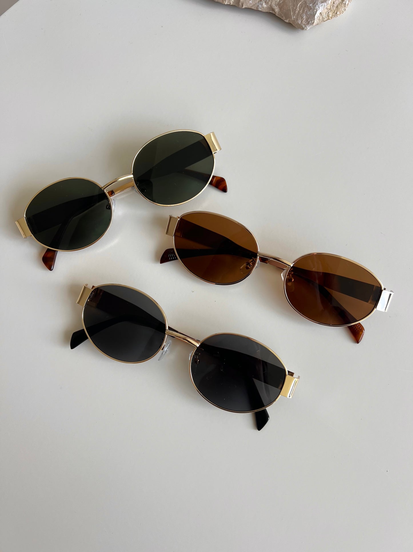 Golden oval sunglasses