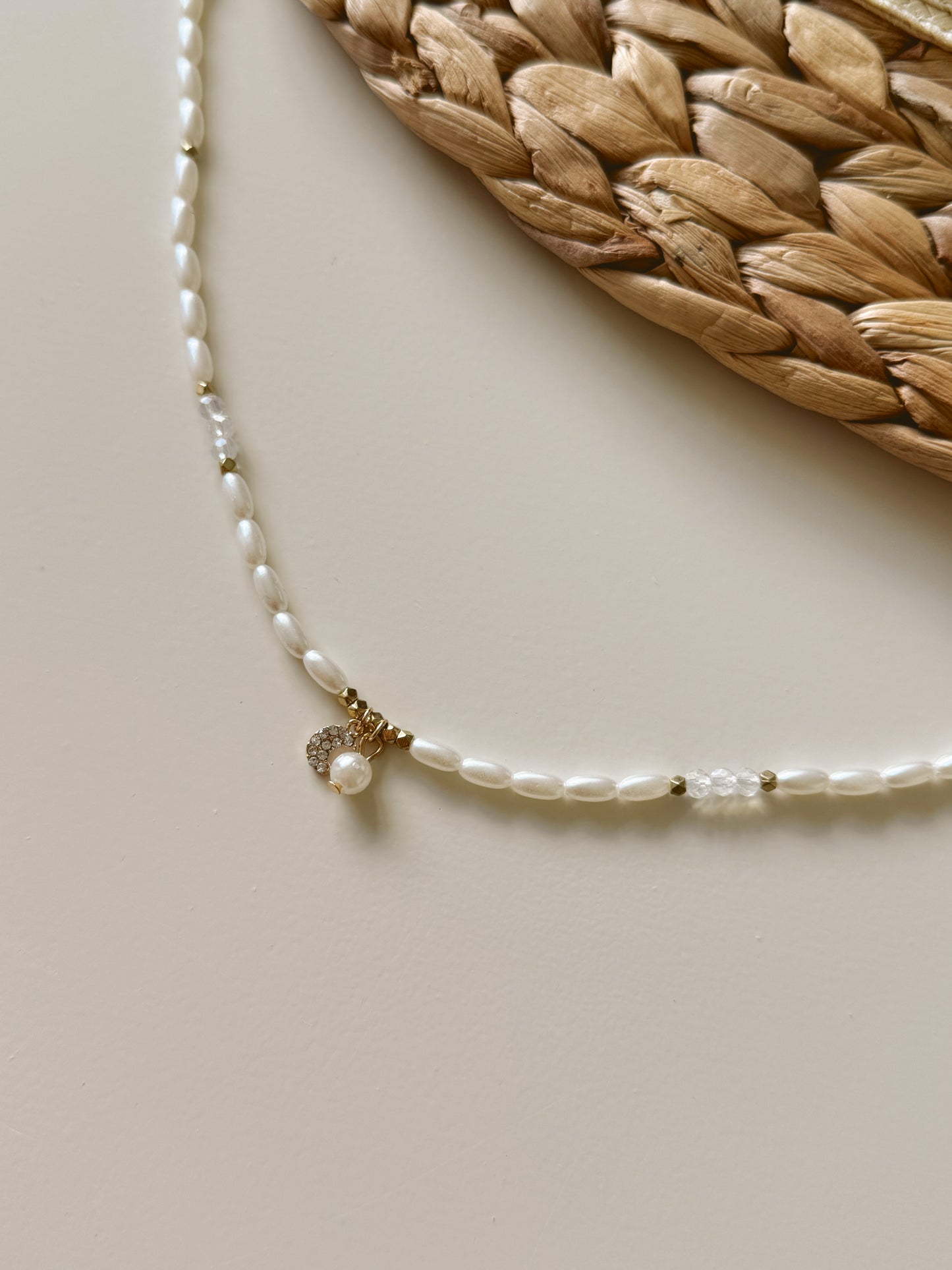 Pearl beads and moon necklace