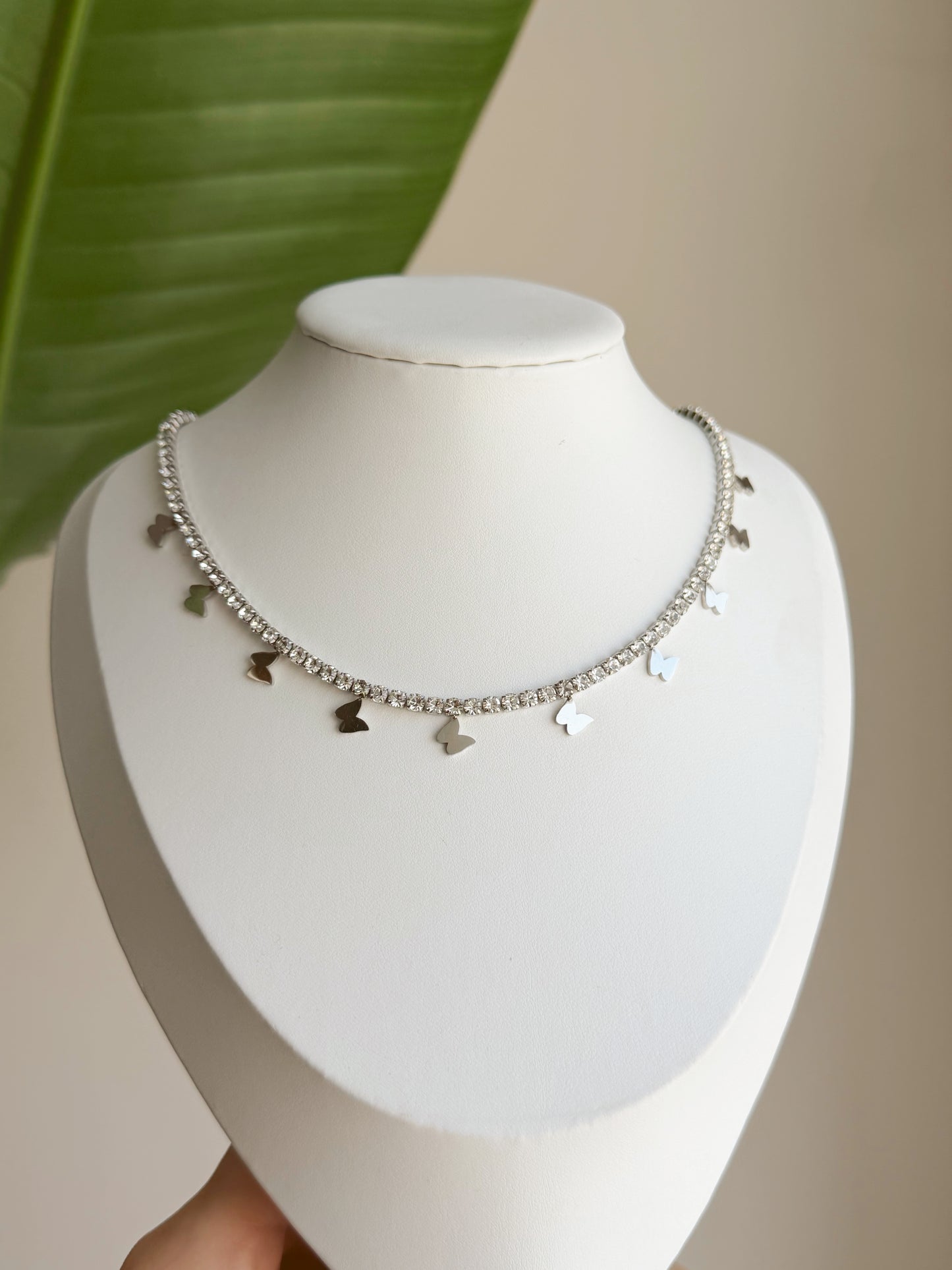 Silver butterfly tennis necklace