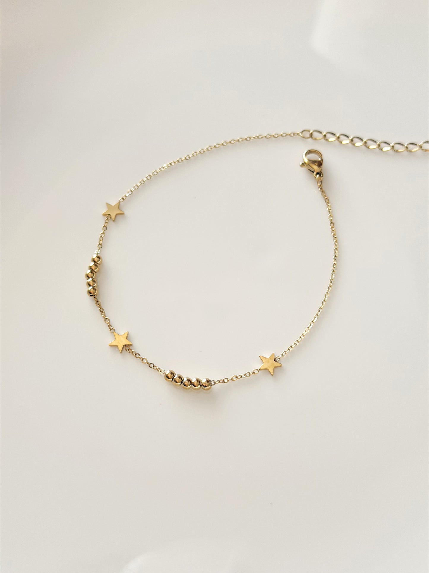 Gold stars anklet
