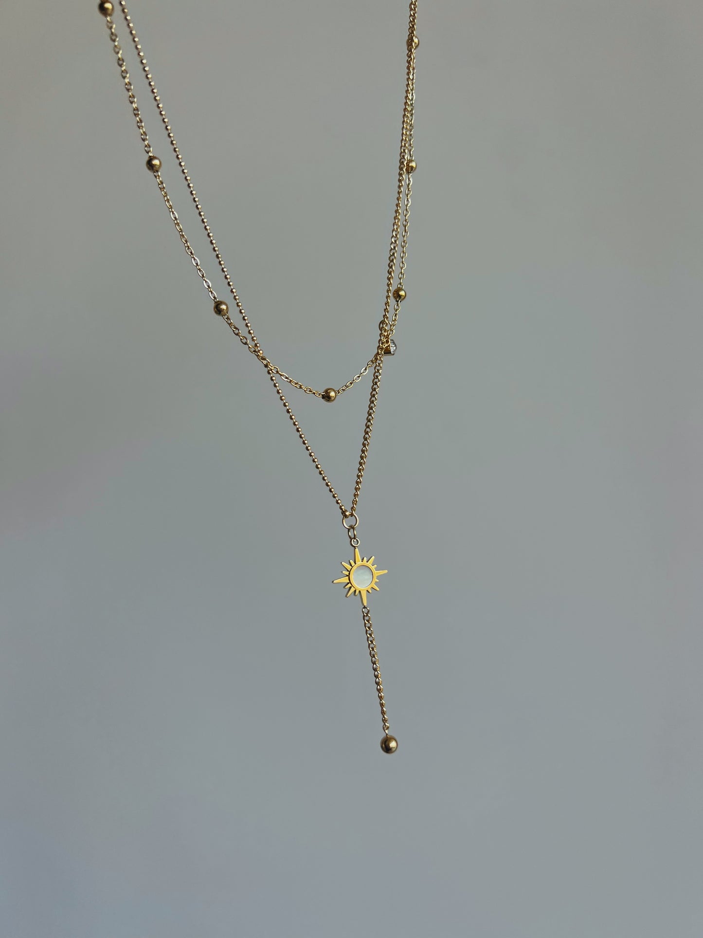 Double sun necklace