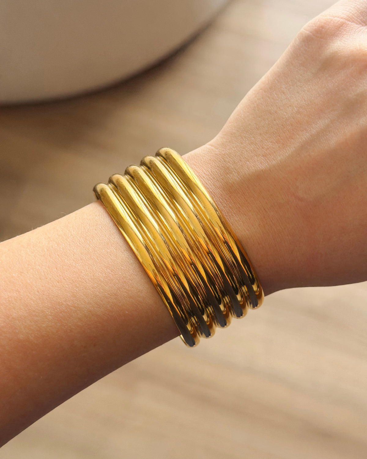 Gold lines hand cuff