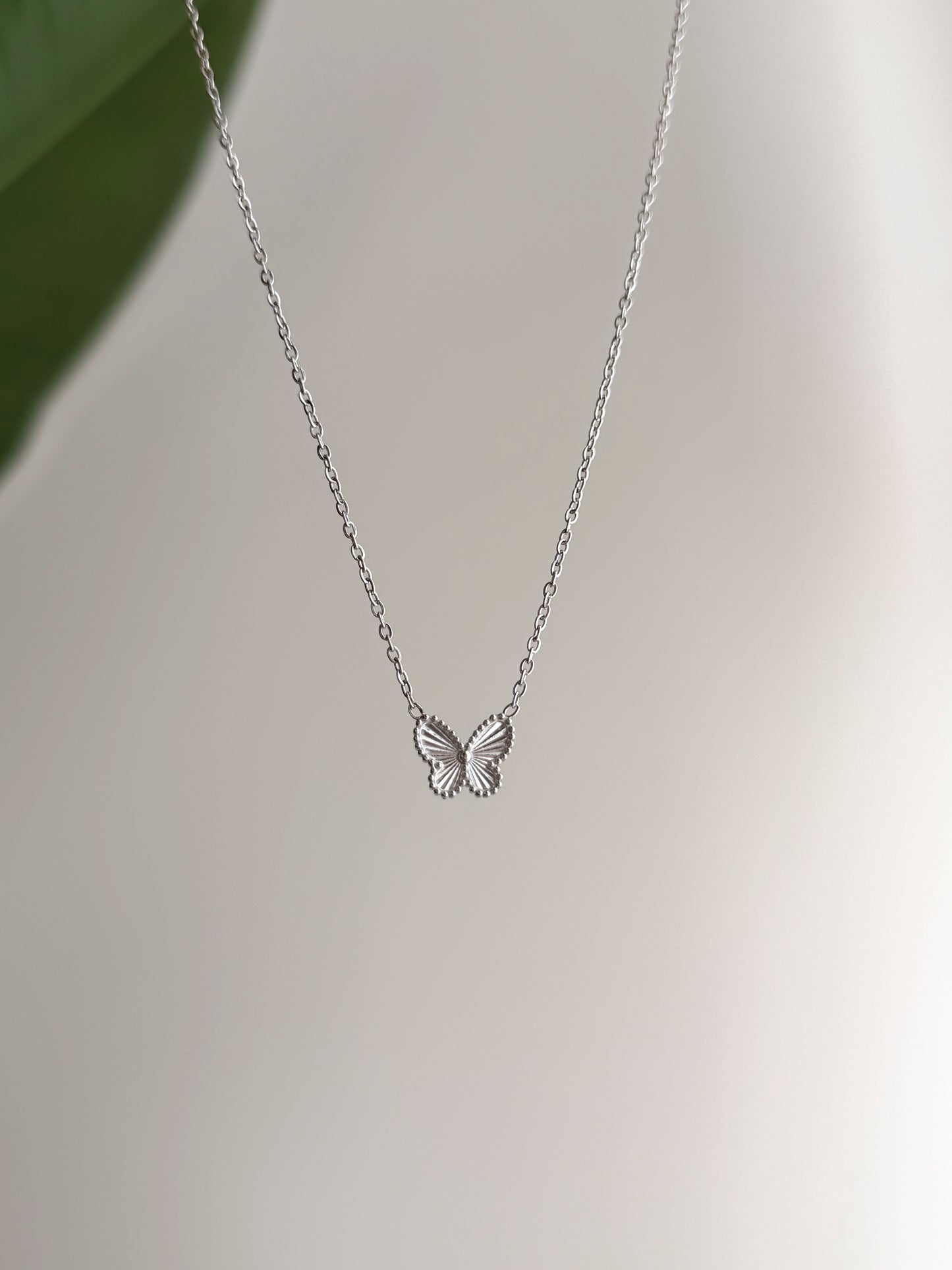 Silver van cleef butterfly necklace