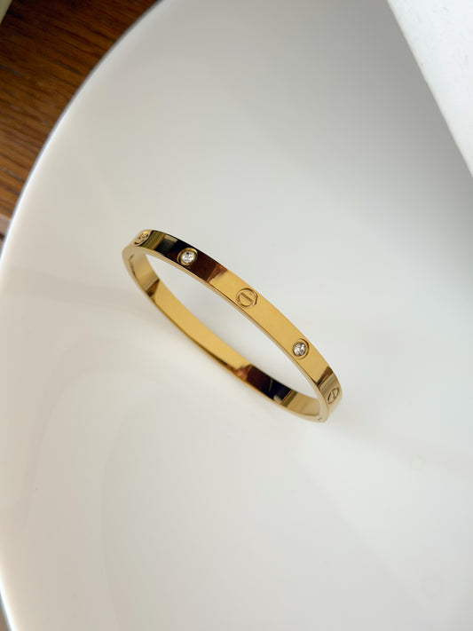 Cartier love bracelet gold with stones