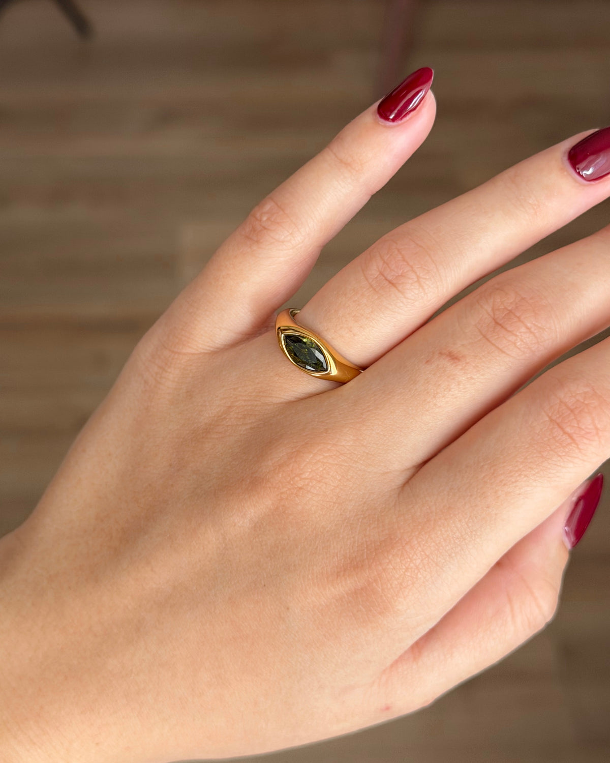 Marquise cut stone ring green